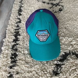 teal and purple Patagonia hat